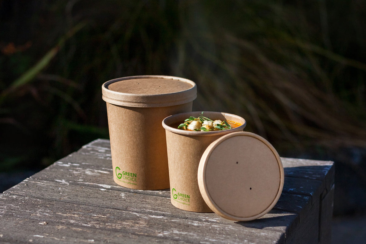 Pumpkin Soup sitting in a Disposable Kraft Soup Bowl with Lid